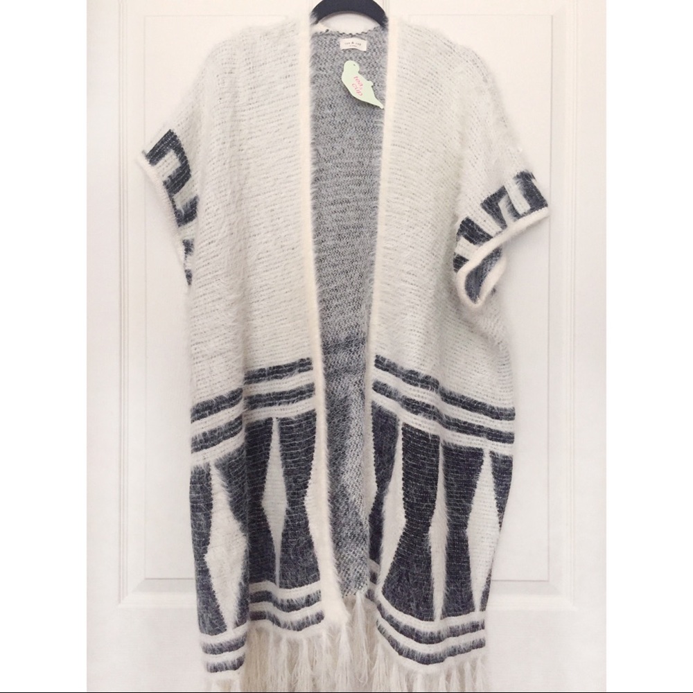 lusciously soft open sleeveless fringe cardigan